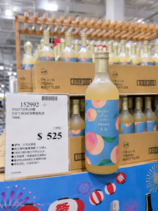 好市多白鶴JUICY MOMO香醇蜜桃酒價格牌，700ml售價525元